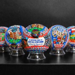 A row of 5 hand-painted baseballs for the MLB 2024 All-Star game