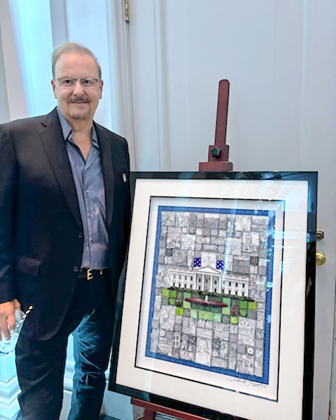 Fazzino stands in front of his The People's House artwork at the WHHA donor event in Washington DC