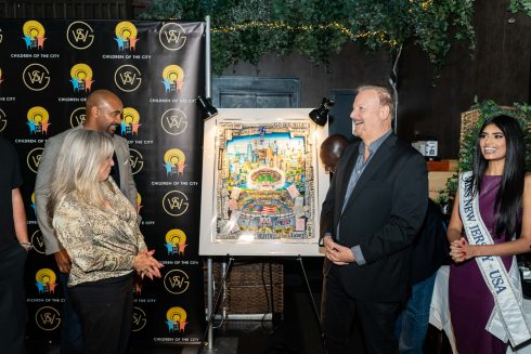 Charles Fazzino unveiling "Celebrating 100 Years of the NY Giants" with Children of the City Founder and Executive Director Joyce Mattera, David Tyree, and Miss New Jersey USA.